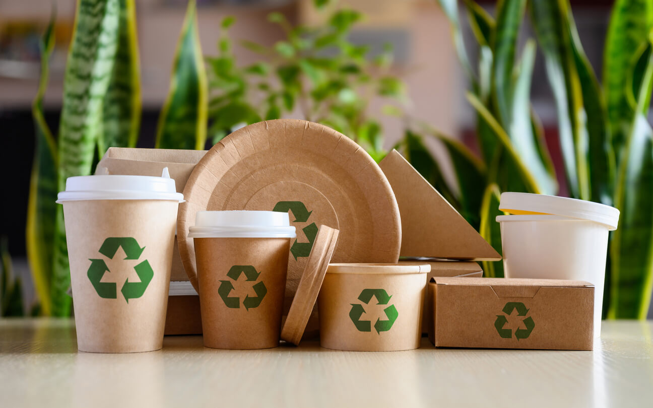 Eco-friendly tableware with recycling signs